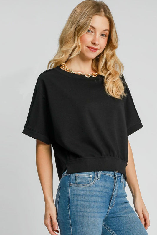 Stylish lightweight cropped sweatshirt with exposed seams and ribbed details, perfect for a casual and trendy look.