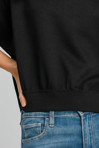 Stylish lightweight cropped sweatshirt with exposed seams and ribbed details, perfect for a casual and trendy look.