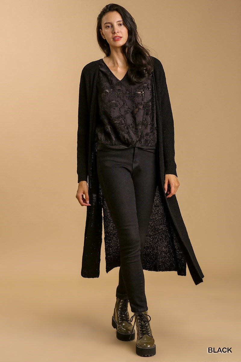 Stylish open front long cardigan with side slits, designed for effortless layering and a chic, relaxed look.