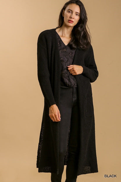 Stylish open front long cardigan with side slits, designed for effortless layering and a chic, relaxed look.