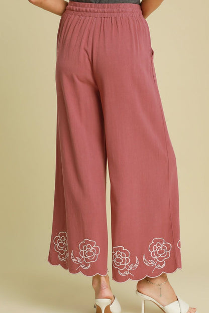 Stylish linen blend wide-leg pants with a chic scalloped hemline, drawstring waist, and pockets for an effortless and breezy look.