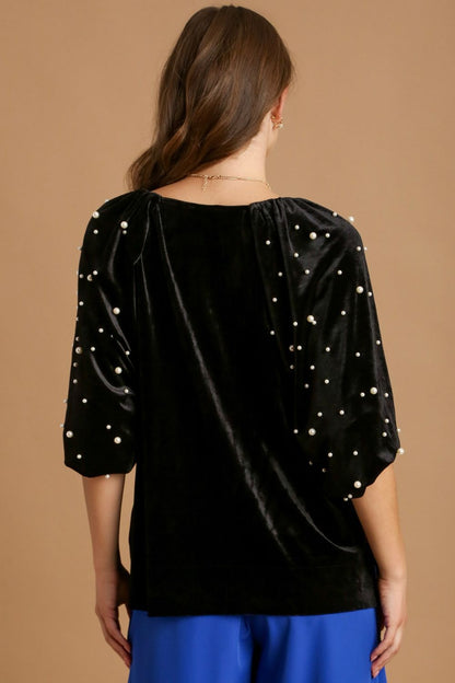 Elegant full-size velvet round neck top with pearl embellishments on the sleeves, perfect for a sophisticated look.