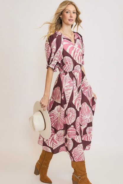 Printed notched puff sleeve midi dress with ruched and ruffled details, designed for a chic and feminine plus-size look.