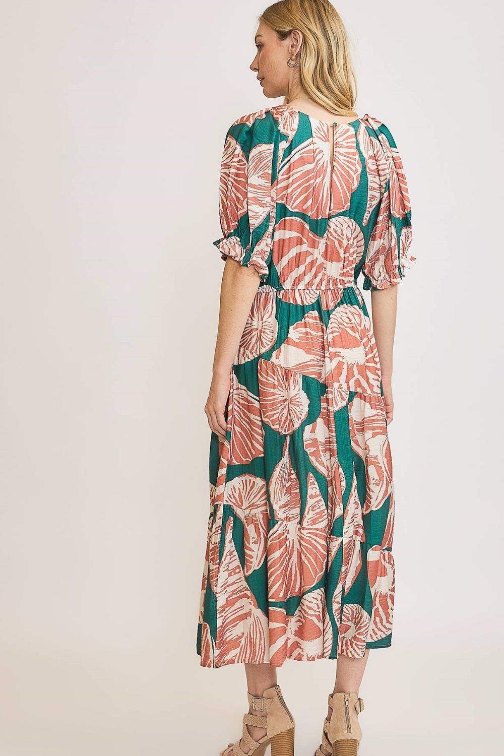 Printed midi dress with notched neckline, puff sleeves, and ruffle details—perfect for a chic and flattering plus-size look.