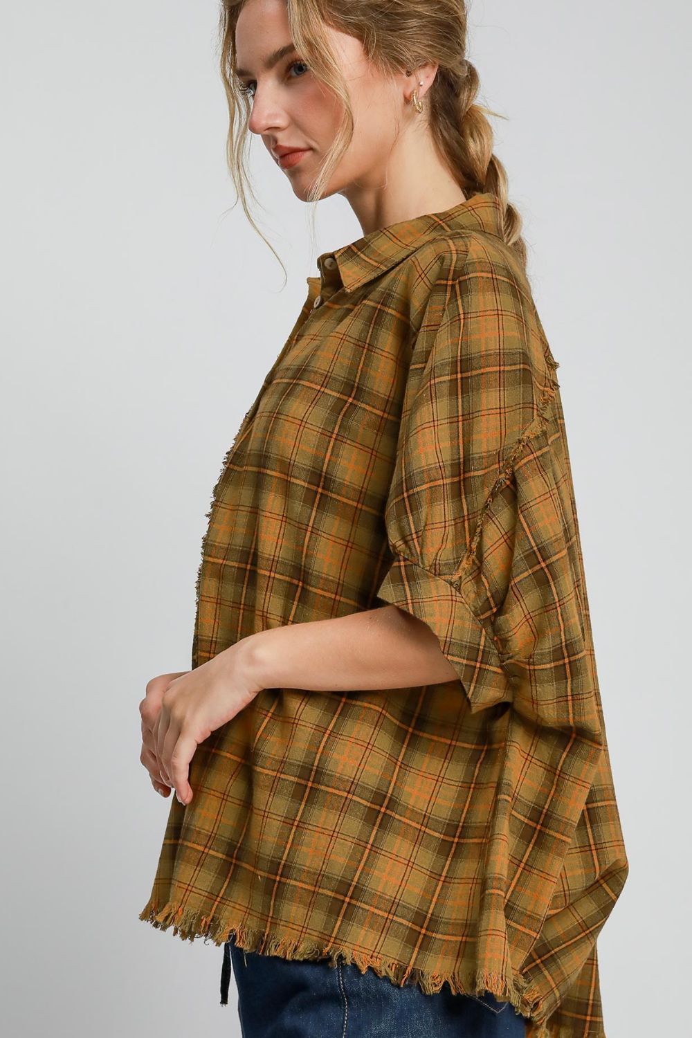 Trendy plaid collared neck half sleeve shirt with a raw hem and exposed seam details, perfect for an effortlessly chic look.