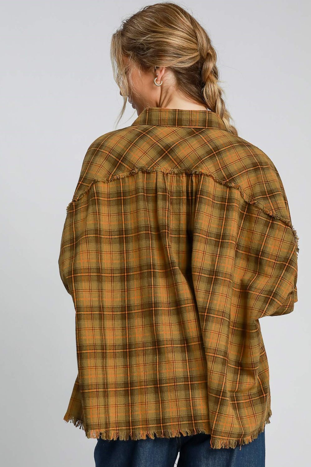 Trendy plaid collared neck half sleeve shirt with a raw hem and exposed seam details, perfect for an effortlessly chic look.