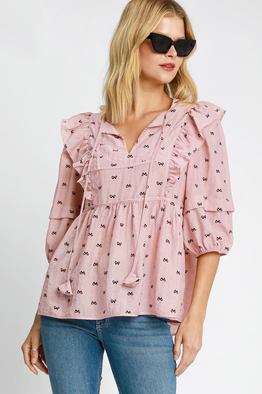 Ruffled bow print tie neck peplum blouse with a flattering silhouette and feminine details, ideal for chic plus-size outfits.