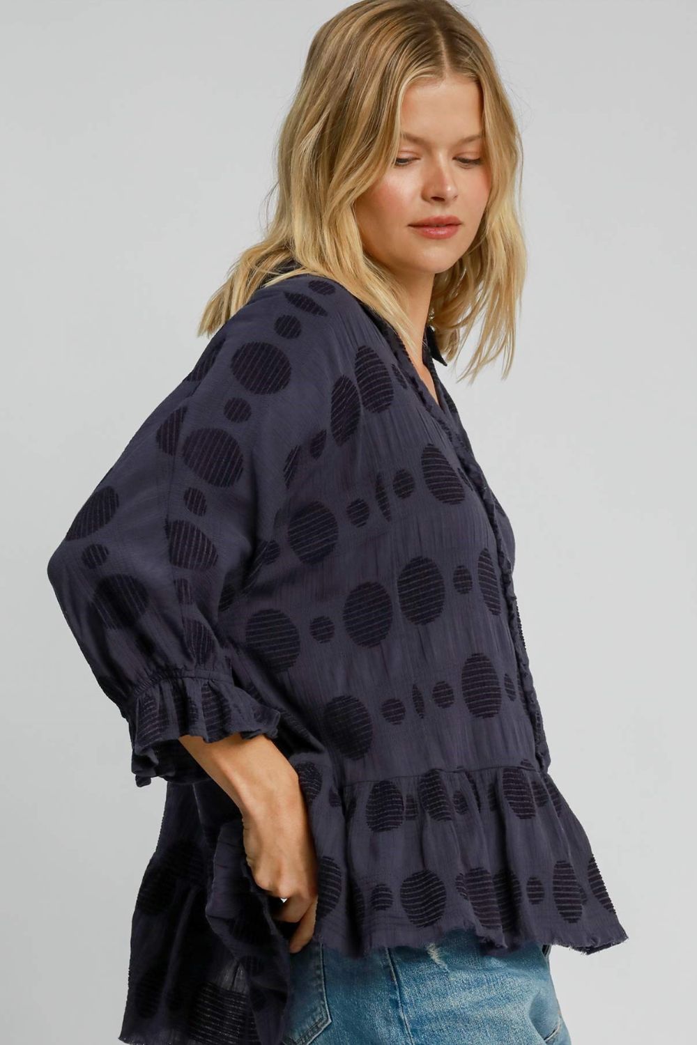 Full size Swiss dot blouse with a half-button front and flounce sleeves, crafted from breathable cotton for a chic and feminine look.