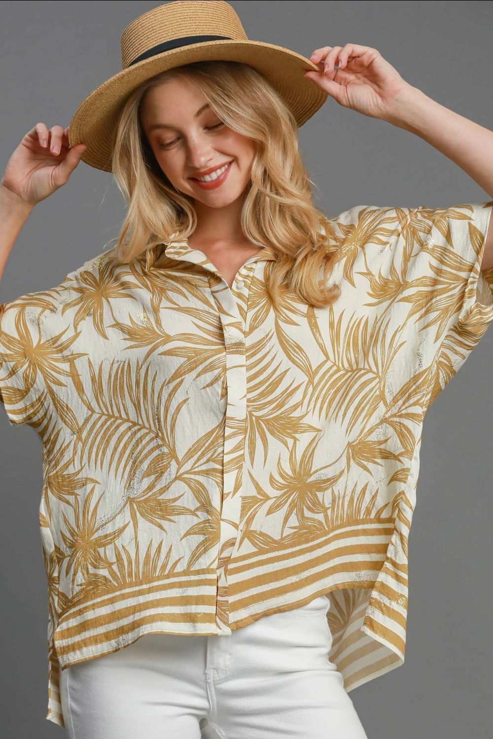 Tropical print button down shirt with high-low hem and slits, perfect for a breezy, colorful plus-size summer outfit.