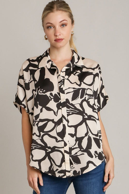 Stylish two-tone print button-down top with hidden plackets and a high-low hemline, perfect for a modern and polished look.