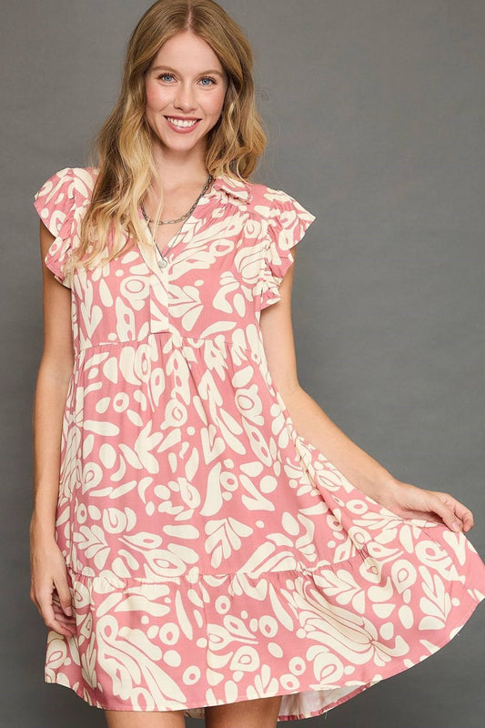 Two-tone printed mini dress with ruffled cap sleeves, offering a fun, flirty, and feminine plus-size style perfect for warm weather.