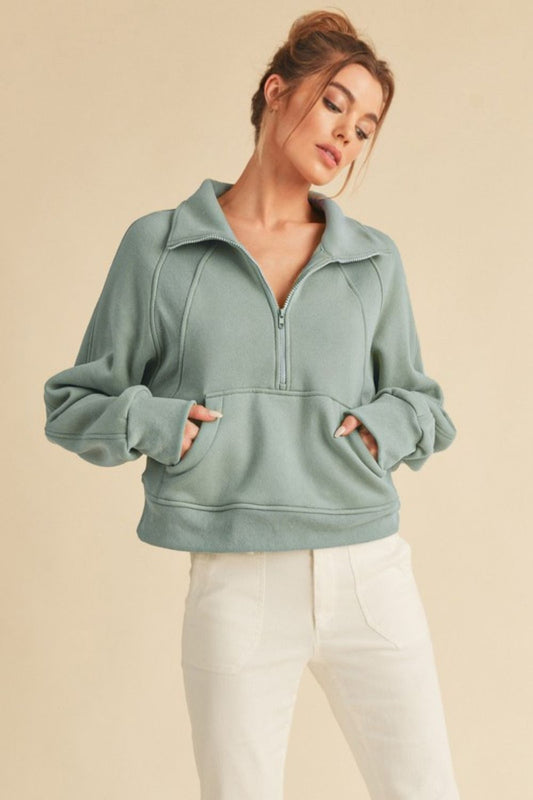 Women's half zip raglan sleeve hoodie with kangaroo pocket – sporty and cozy