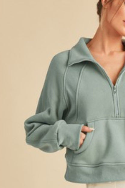 Women's half zip raglan sleeve hoodie with kangaroo pocket – sporty and cozy