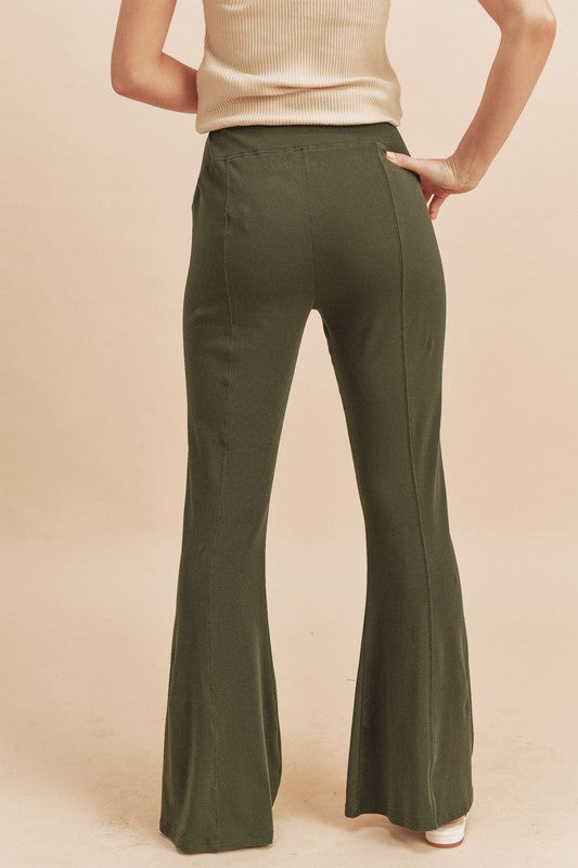 Chic high-waist flare pants with a retro silhouette, perfect for elongating the legs and creating a stylish look.