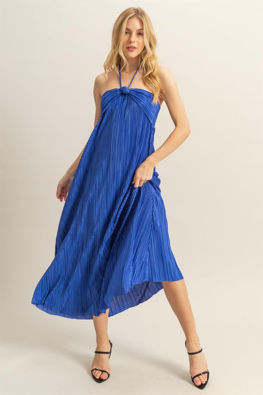 A chic knotted halter neck maxi dress with a flowy silhouette, perfect for elegant occasions.