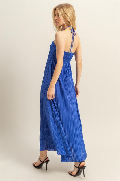 A chic knotted halter neck maxi dress with a flowy silhouette, perfect for elegant occasions.