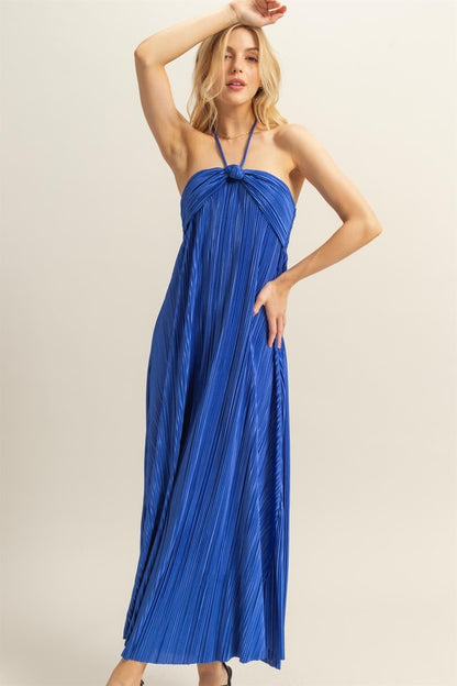 A chic knotted halter neck maxi dress with a flowy silhouette, perfect for elegant occasions.