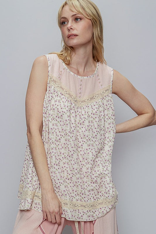 Women's sleeveless floral top with lace details and round neckline – elegant and chic