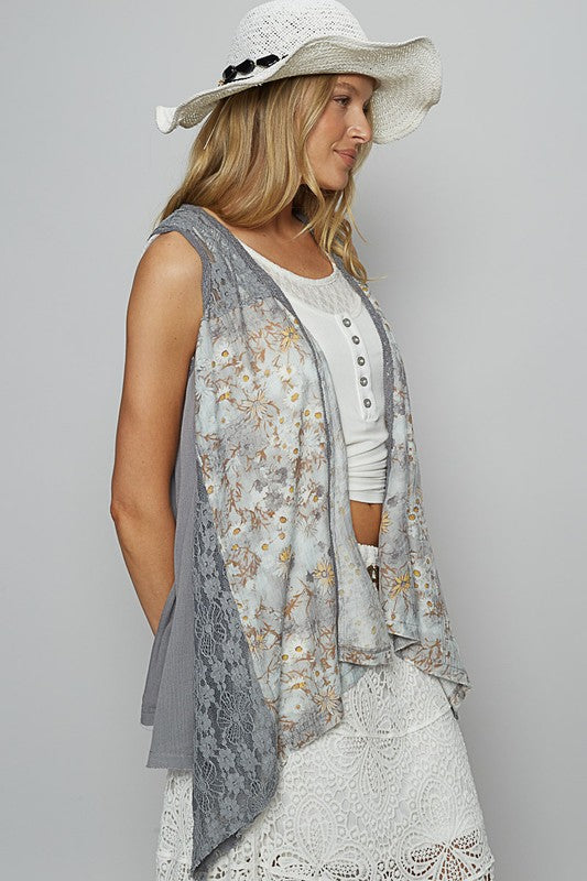 Women's lace patchwork sleeveless cardigan with floral details and open front design – elegant and lightweight layering piece