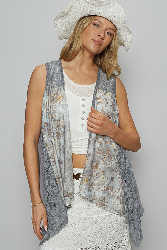 Women's lace patchwork sleeveless cardigan with floral details and open front design – elegant and lightweight layering piece