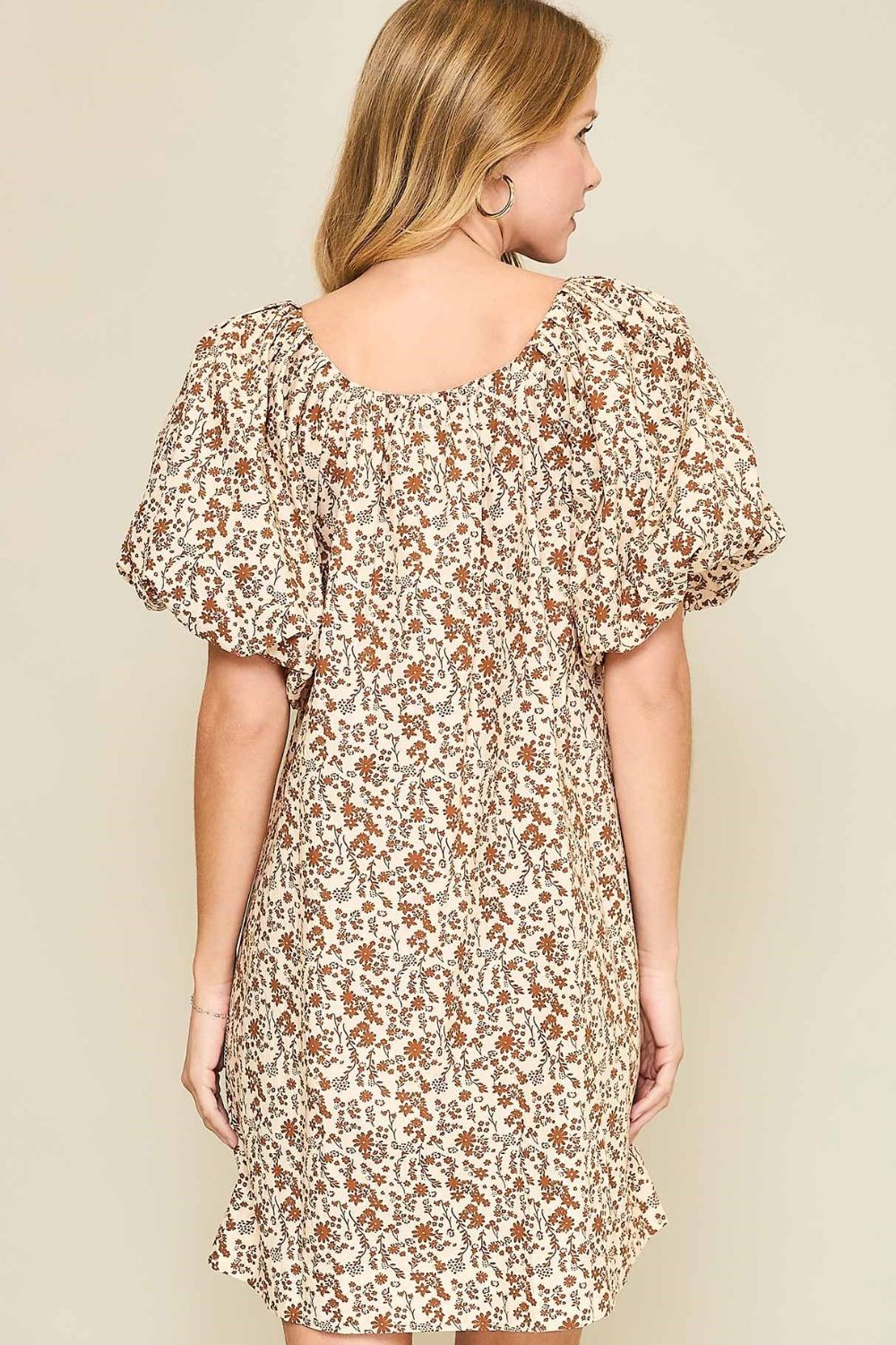 Floral print mini dress with lace tape detailing, puff sleeves, and a drawstring waist for a flattering silhouette.