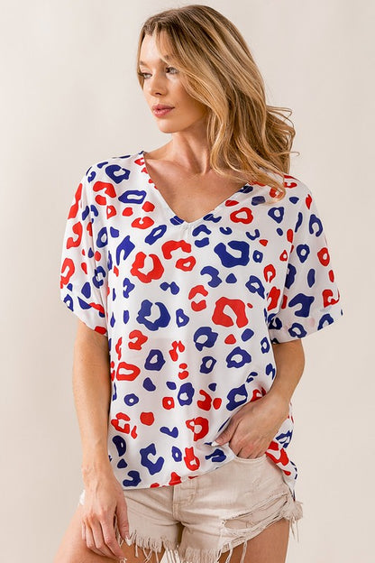 Chic leopard print V-neck short sleeve blouse, perfect for a bold and stylish look.