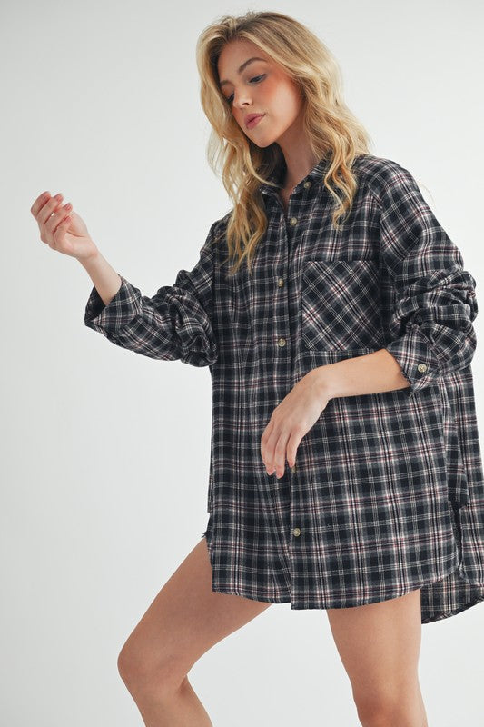 Classic plaid button-up flannel shirt with a chest pocket, perfect for layering and casual styling.