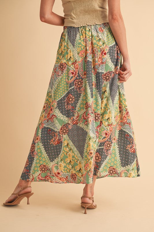 Flowy printed maxi skirt with a bold pattern, perfect for casual or dressy outfits.