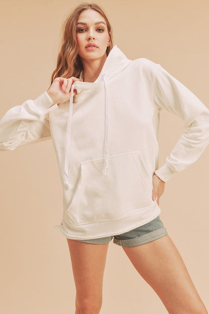 Stylish raw hem hoodie with a drawstring hood and kangaroo pocket, perfect for casual and trendy wear.