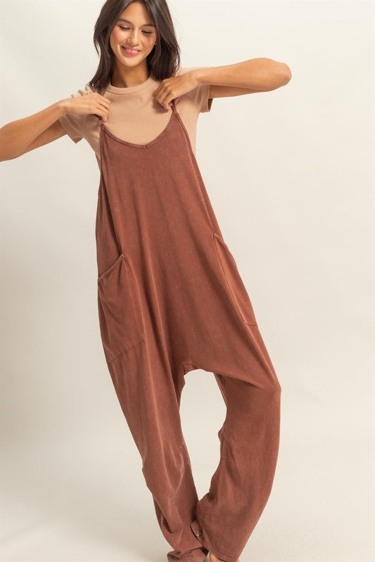 Vintage-inspired relaxed fit mineral washed overalls with functional pockets for effortless casual style.