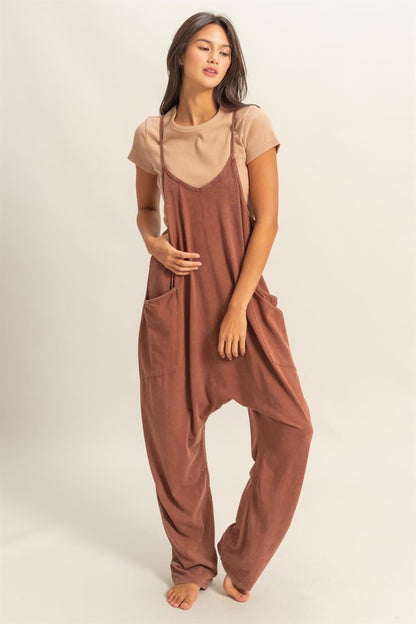 Vintage-inspired relaxed fit mineral washed overalls with functional pockets for effortless casual style.