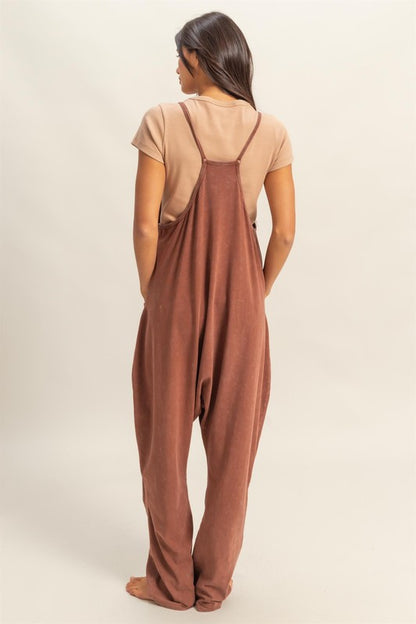 Vintage-inspired relaxed fit mineral washed overalls with functional pockets for effortless casual style.