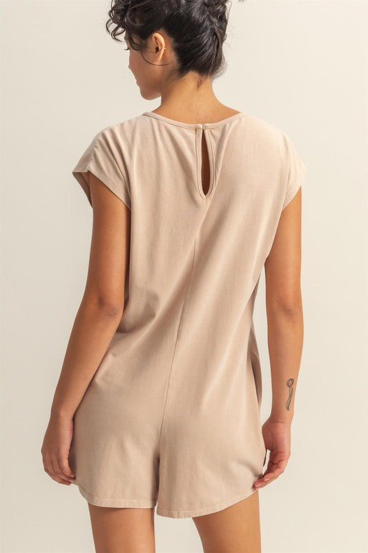 Lightweight round neck cap sleeve breezy romper with a relaxed fit, perfect for summer outings and casual wear.