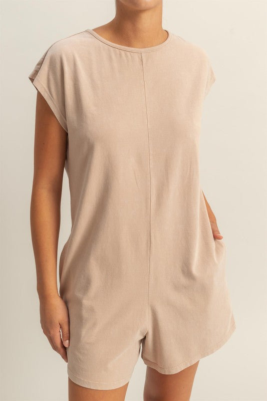 Lightweight round neck cap sleeve breezy romper with a relaxed fit, perfect for summer outings and casual wear.