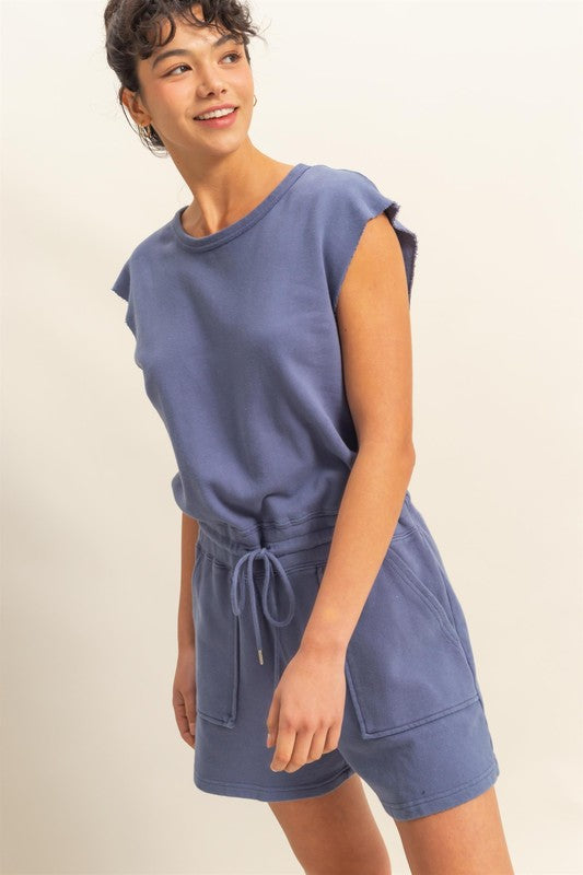 Casual round neck cap sleeve drawstring waist romper with pockets for effortless style and comfort.