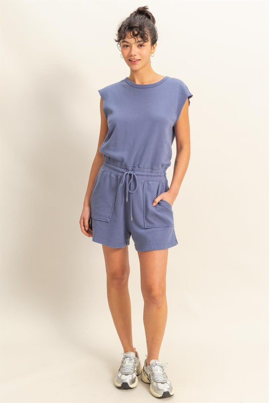 Casual round neck cap sleeve drawstring waist romper with pockets for effortless style and comfort.