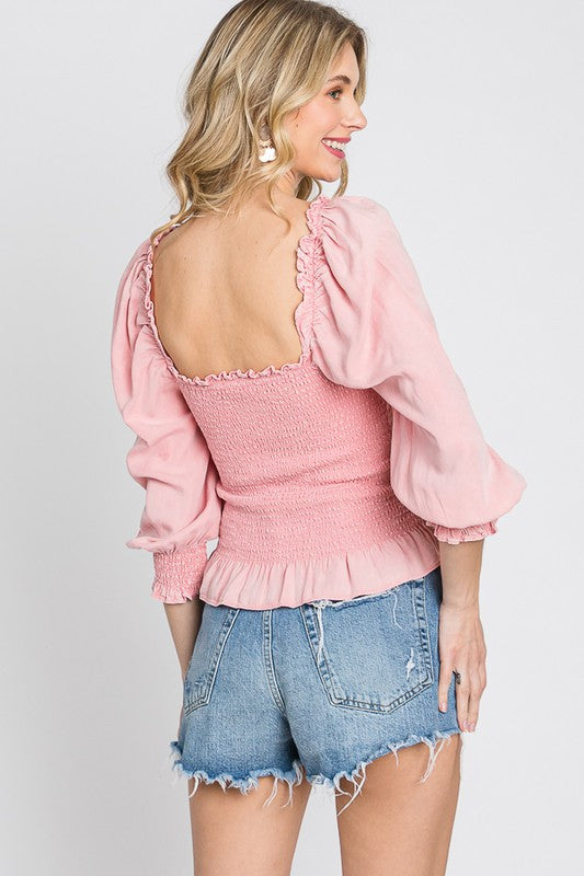 Ruffled smocked frill square neck top with elegant details, perfect for chic and feminine styling.