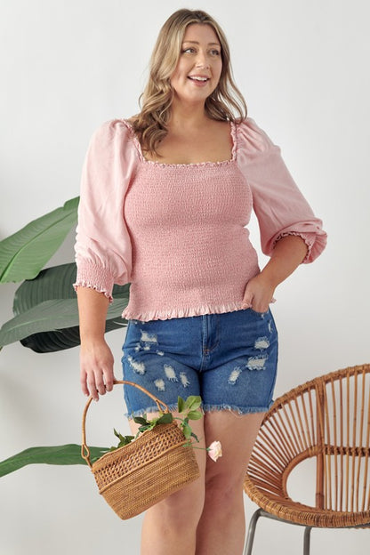 Ruffled smocked frill square neck top with elegant details, perfect for chic and feminine styling.