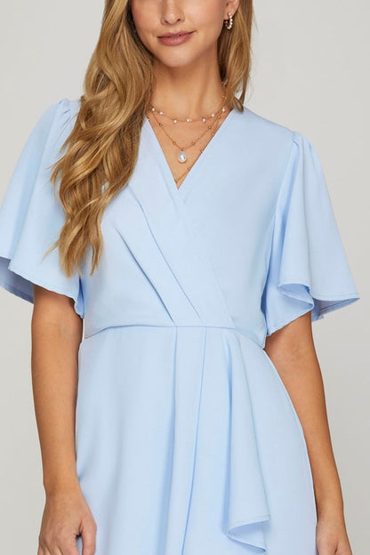 Ruffled surplice short flutter sleeve mini dress in a chic and feminine design, perfect for any occasion.