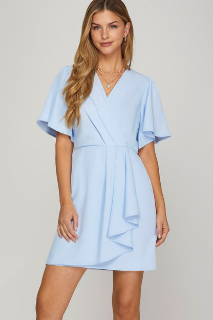 Ruffled surplice short flutter sleeve mini dress in a chic and feminine design, perfect for any occasion.