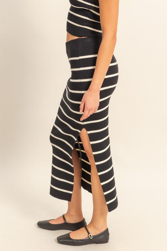 Striped bodycon sweater skirt with side slits, offering a stylish & cozy look.