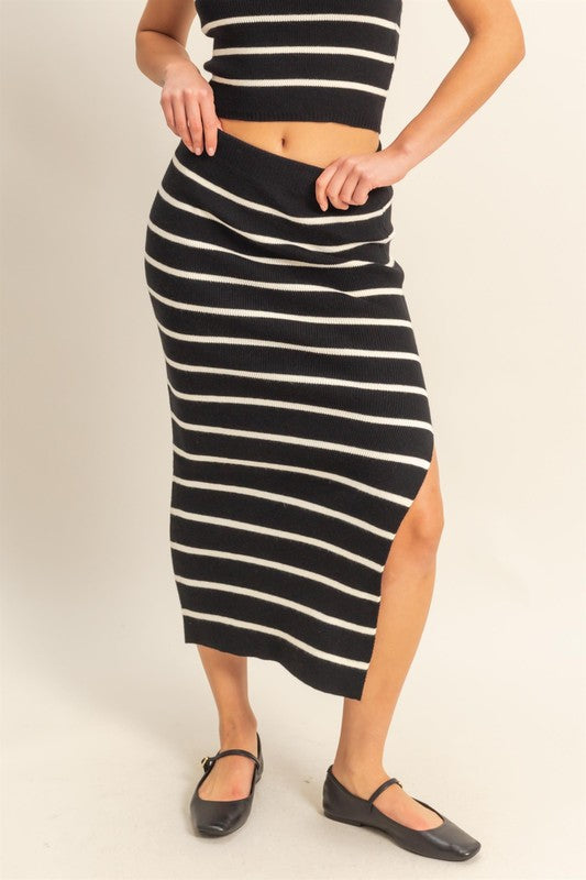 Striped bodycon sweater skirt with side slits, offering a stylish & cozy look.