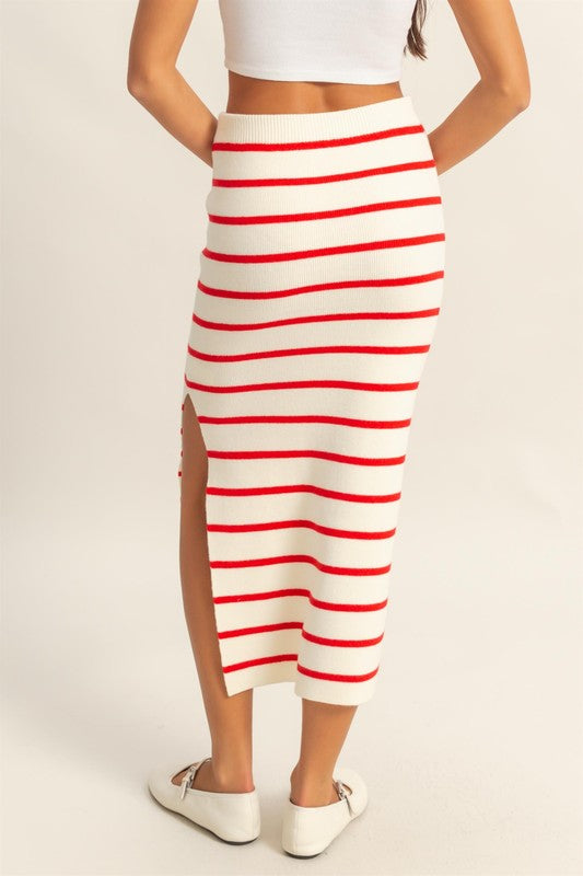 Side slit striped bodycon sweater skirt with a snug fit, cozy knit fabric, and elegant slit detail for a stylish winter look.