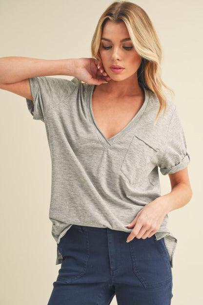 Women's side slit V-neck short rolled sleeve t-shirt in a casual chic design