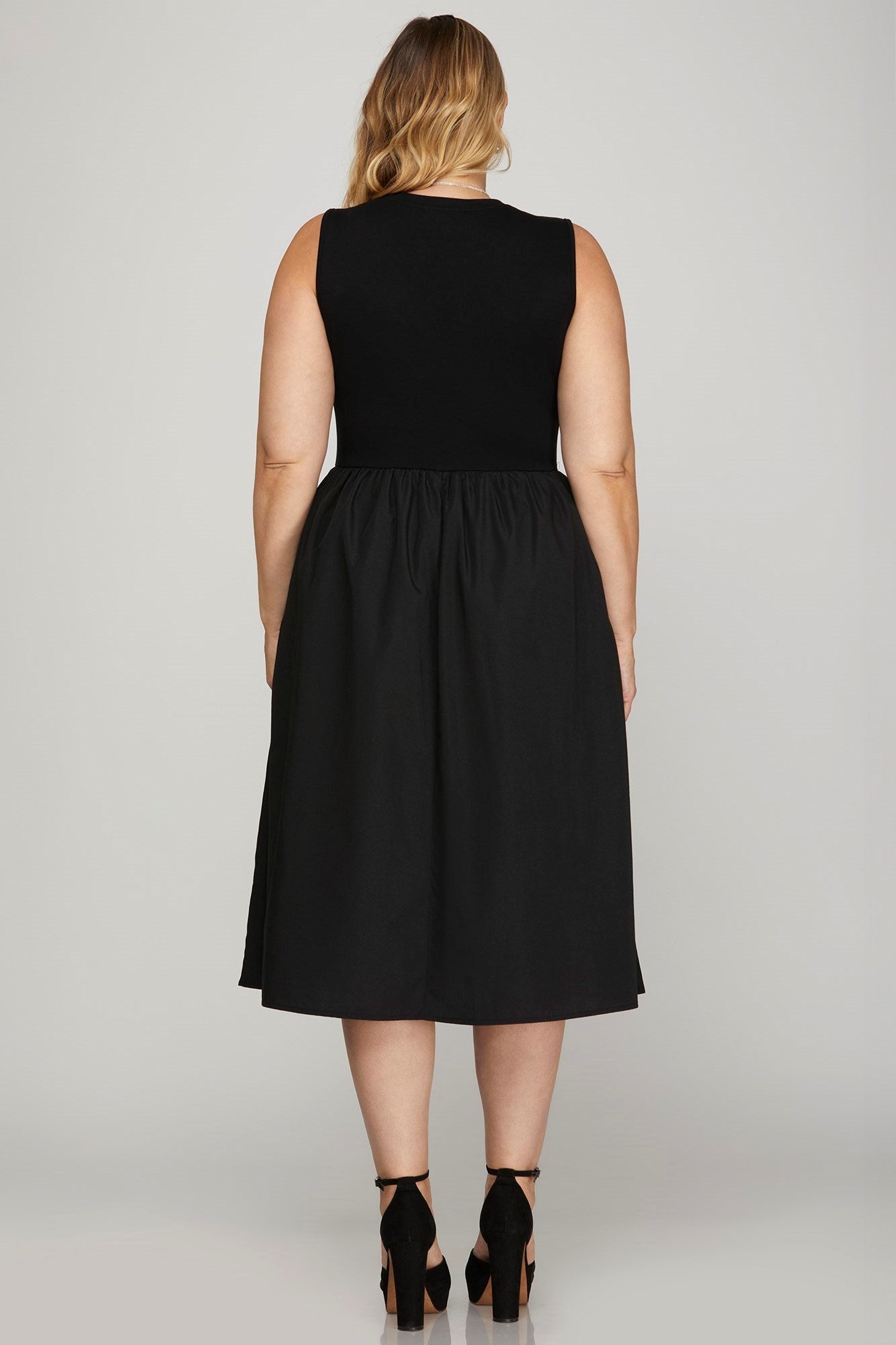 Full-size sleeveless poplin woven midi dress with pockets, featuring a flattering and breathable design for versatile styling.