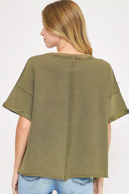 Trendy star-patched French terry top with a mineral-washed finish, offering a cozy and playful casual style.