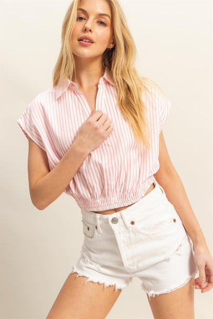 Stylish striped Johnny collar cap sleeve blouse with an elastic hem for a flattering and comfortable fit.