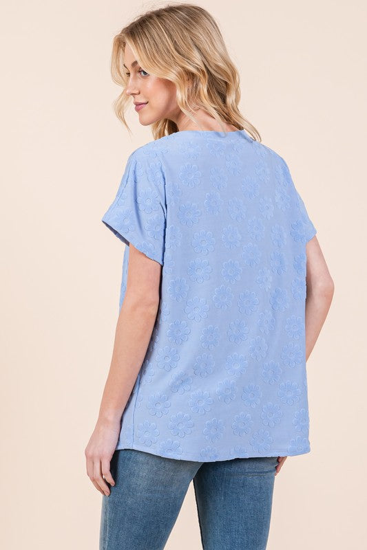 Chic textured floral pattern short sleeve t-shirt, perfect for a stylish and comfortable casual look.