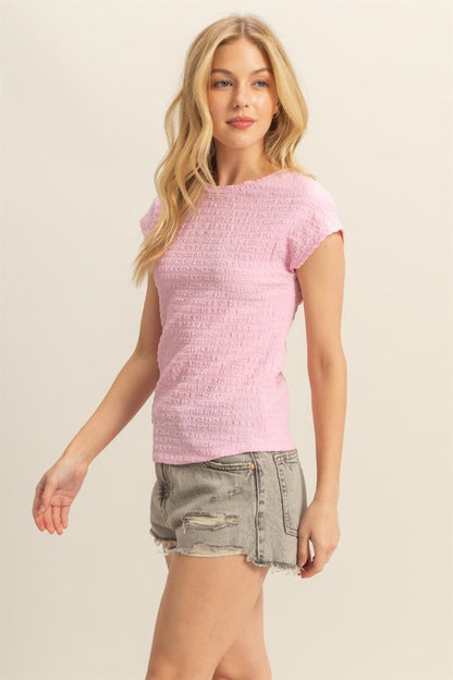 Textured round neck cap sleeve knit top in a versatile design, perfect for everyday wear.