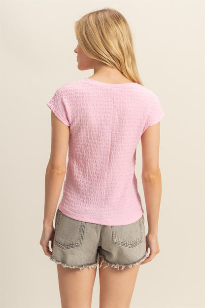 Textured round neck cap sleeve knit top in a versatile design, perfect for everyday wear.